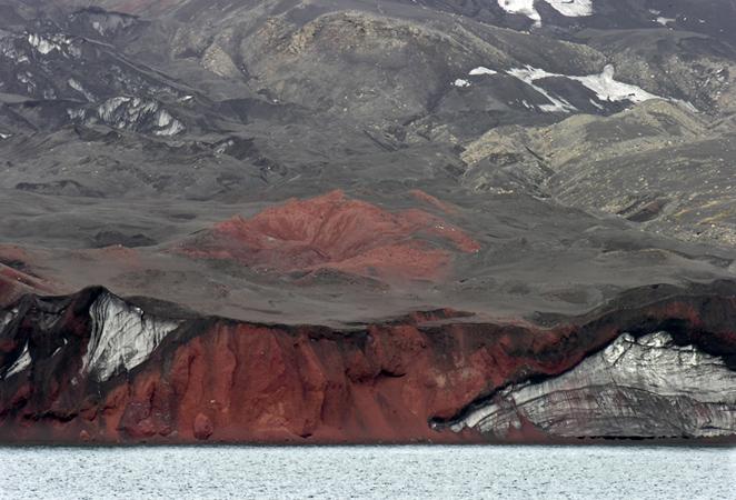 Volcanic debris covering glacier on Deception Island, Antarctica